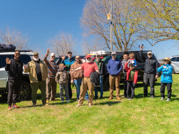 Indiana Land Cruiser members waving to the camera while on the Blue River Valley Circle Cruise & Cattail Springs Overnight Camping.